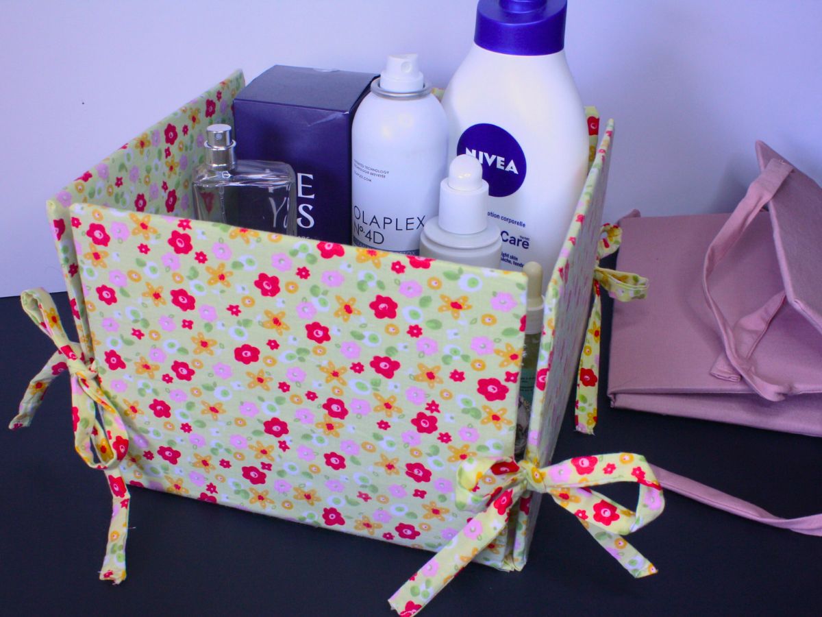 collapsible fabric storage box filled with toiletries