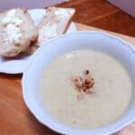 celery soup with walnuts and buttered bread