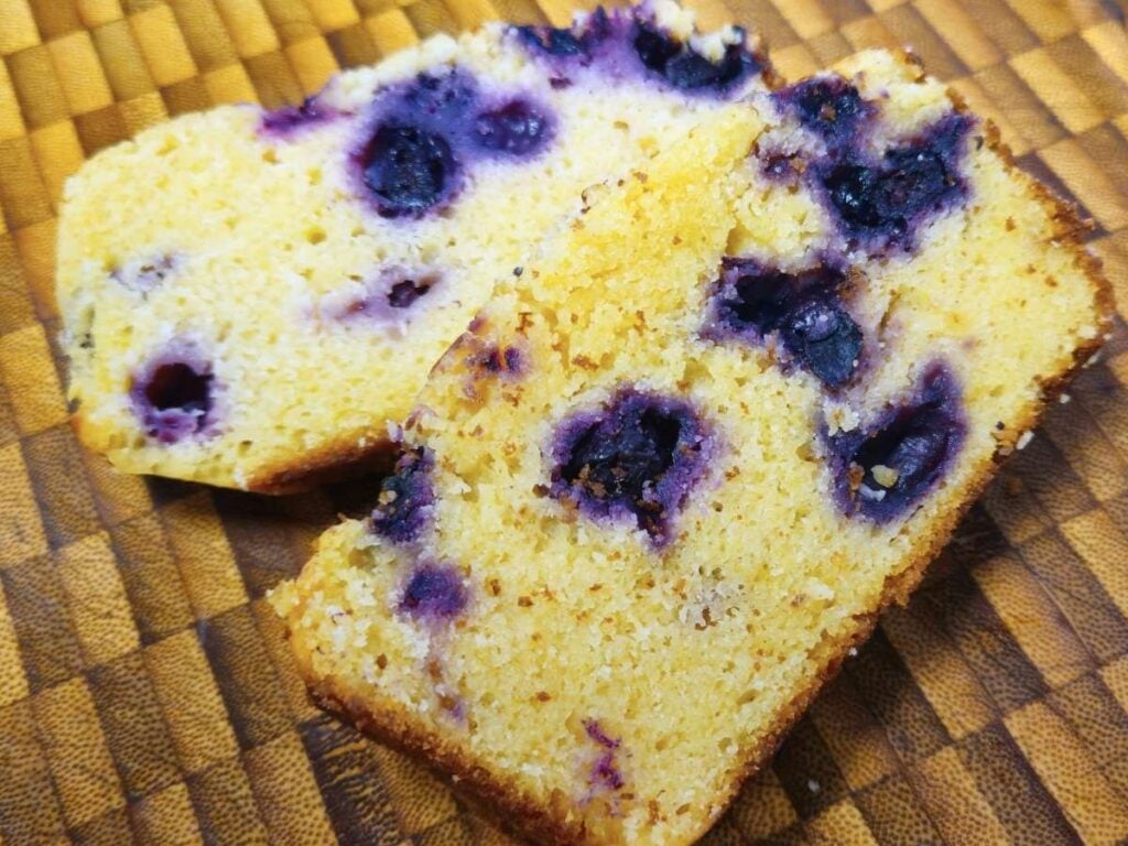 two slices of the blueberry lemon loaf
