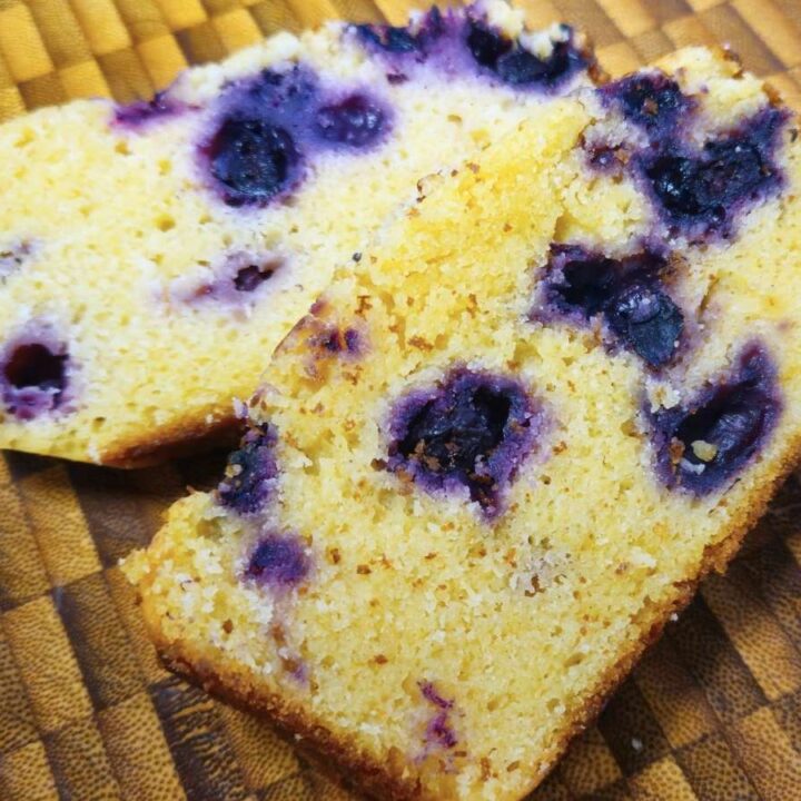 two slices of the blueberry lemon loaf