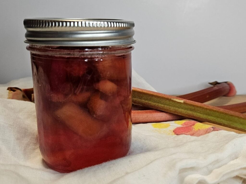 a jar of rhubarb in syrup