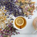 dried herbs for herbal tea with a cup of lemon tea
