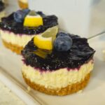 A side shop of a mini lemon cheesecake