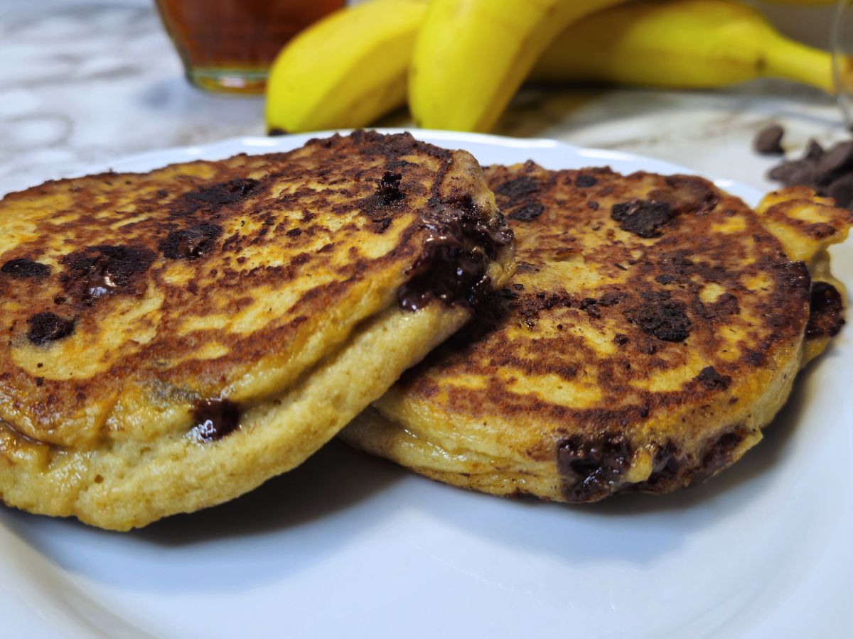 two gluten free banana pancakes on a plate