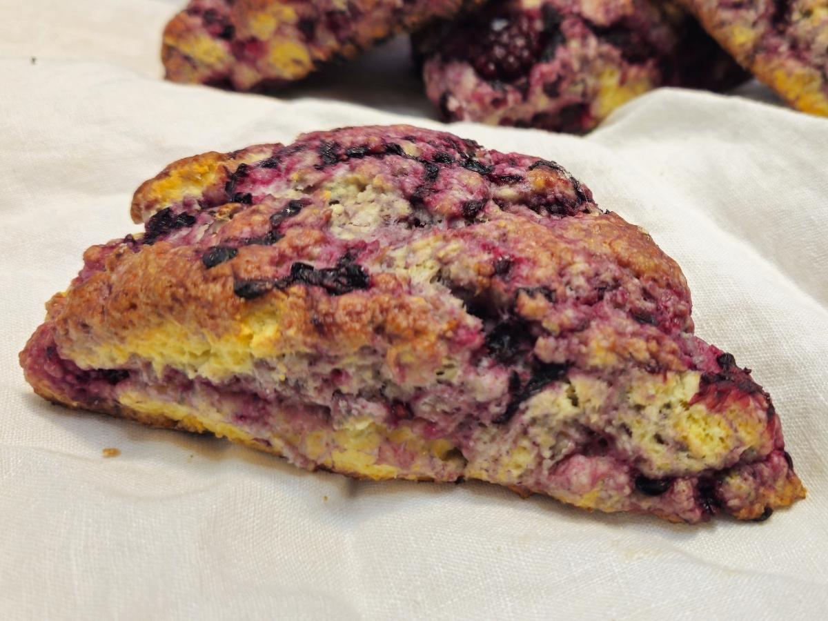 a closeup of a blackberry scone
