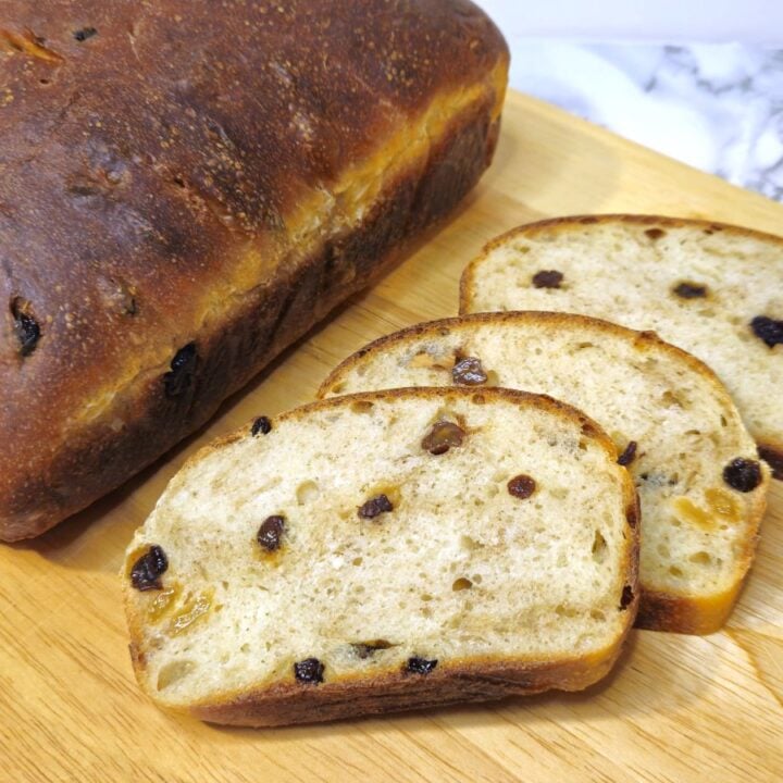 a cinnamon fruit bread beside slices of the bread