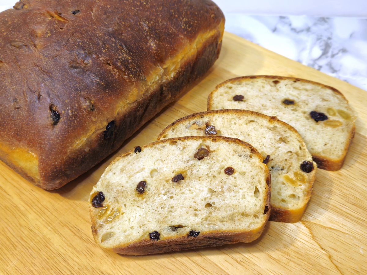a cinnamon fruit bread beside slices of the bread