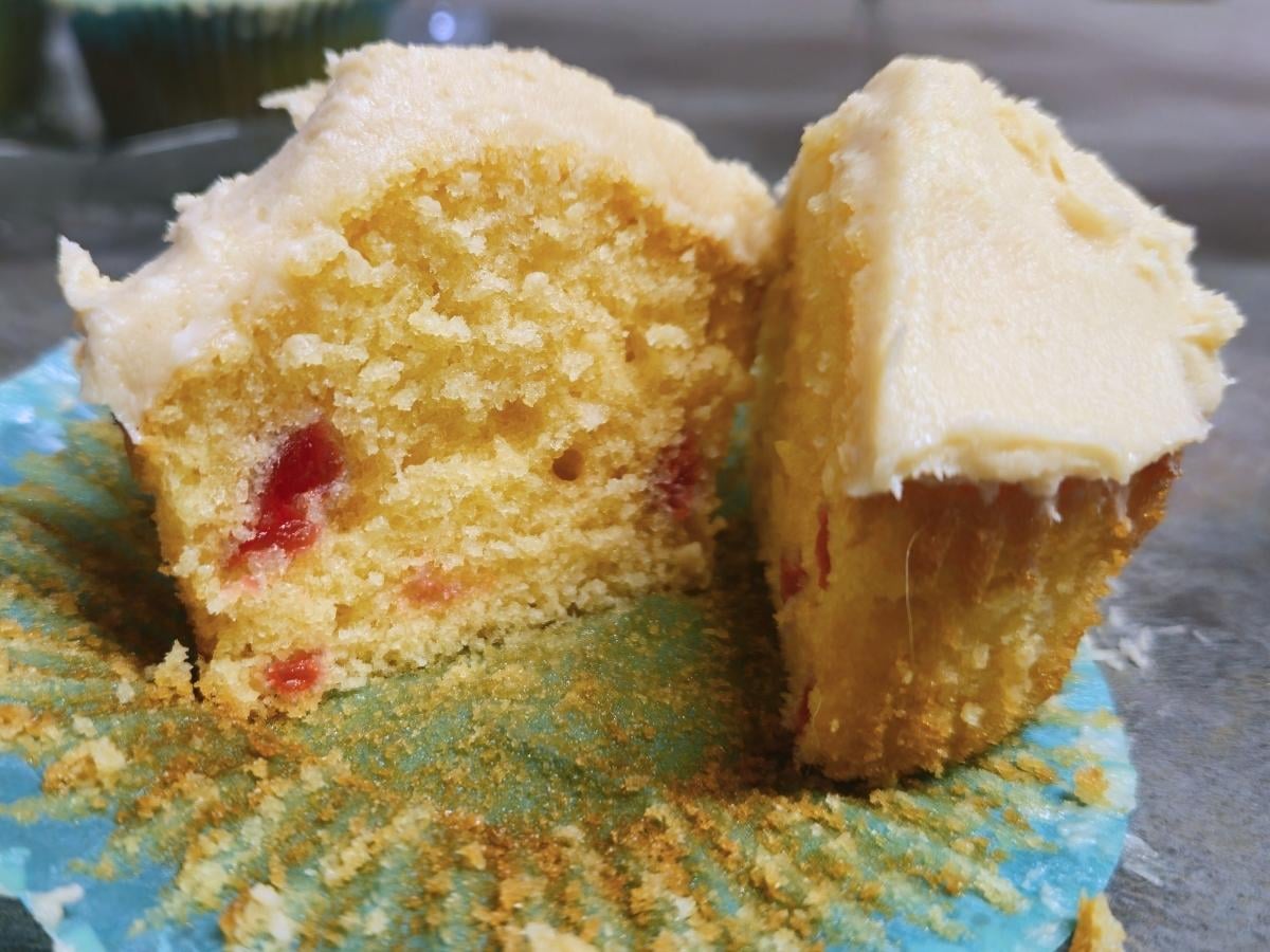 an almond cupcake sliced in half
